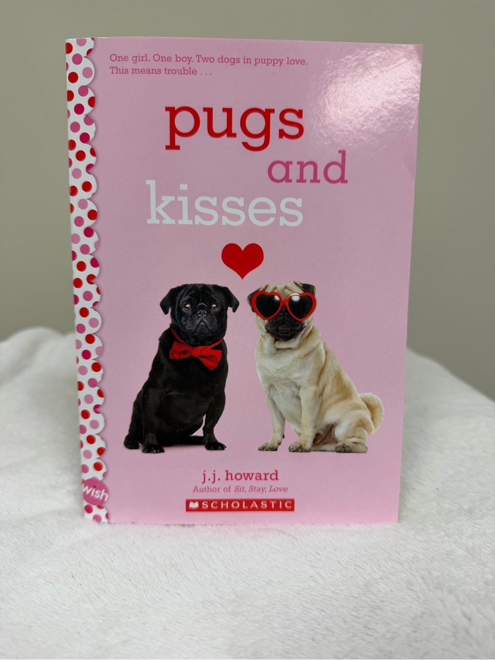 Pugs snd Kisses by J.J. Howard